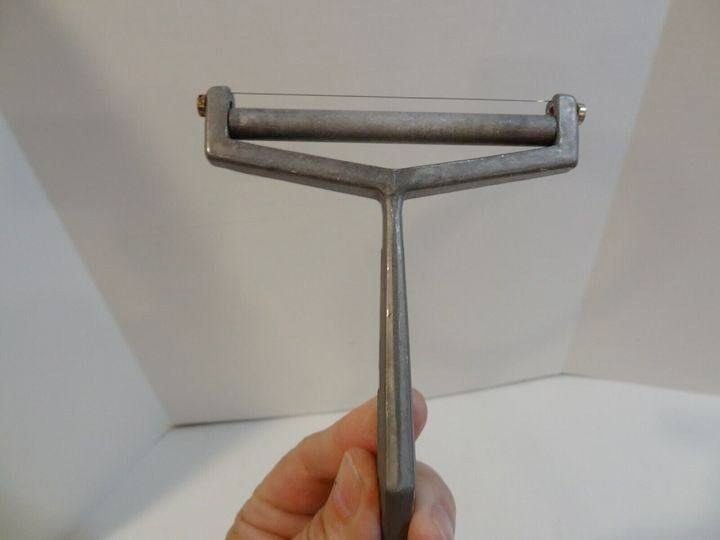 The Enigma of the Cheese Slicer: A Slice of History